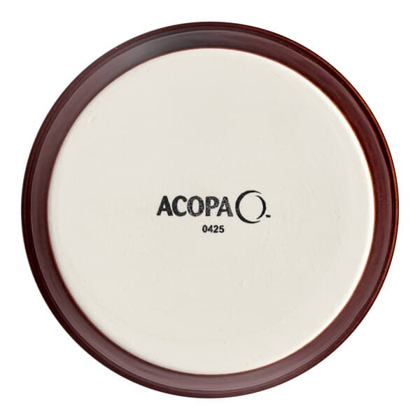 A white Acopa ramekin with a brown rim.