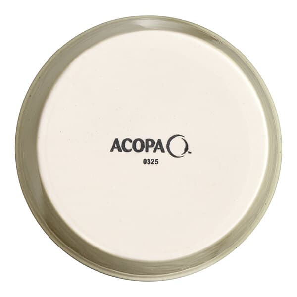 A white porcelain ramekin with black text that reads "Acopa Keystone" on it.